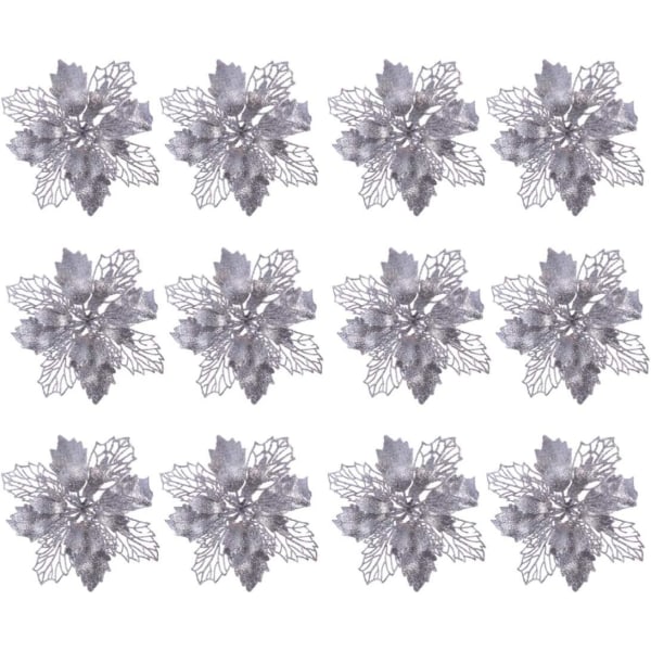 En set av 12 konstgjorda glittrande julstjärnor i silver, använd för Chri