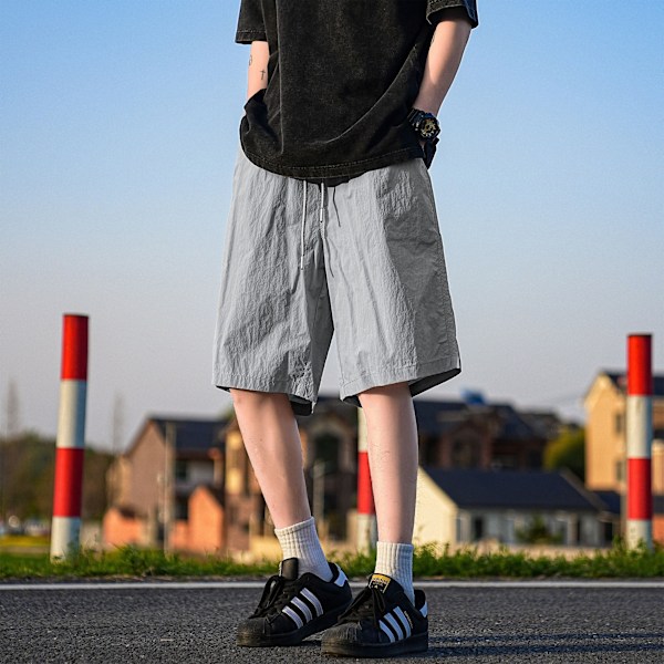 2024 Nya Cool Snabbtorkande Shorts Mäns Sommar Lättviktiga Japanska Pojkar Lös Fritid Sport Shorts Orange XL
