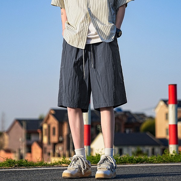 2024 Nya Cool Snabbtorkande Shorts Mäns Sommar Lättviktiga Japanska Pojkar Lös Fritid Sport Shorts Black L