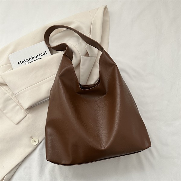 Western-Style Väska Tote Bag Kvinnors 2023 Ny Fashion Solid Färg Textur Axelpåse Årets Populära Underarmspåsen Brown