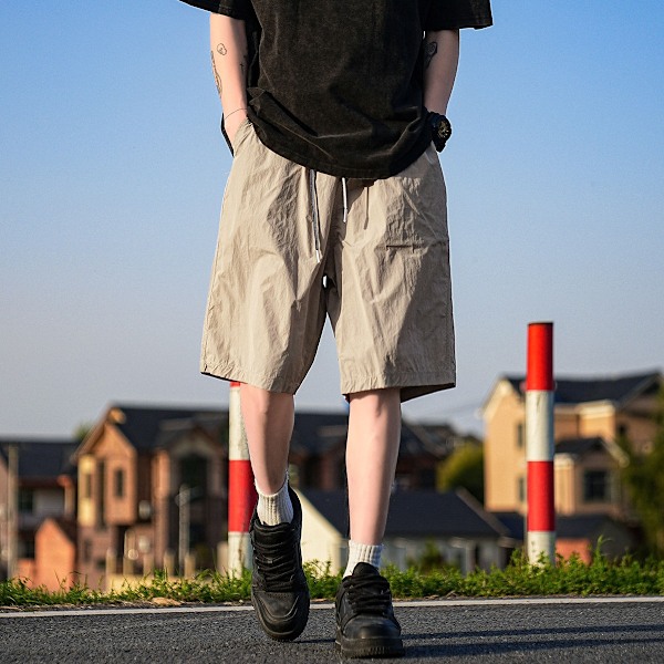 2024 Nya Cool Snabbtorkande Shorts Mäns Sommar Lättviktiga Japanska Pojkar Lös Fritid Sport Shorts Black L