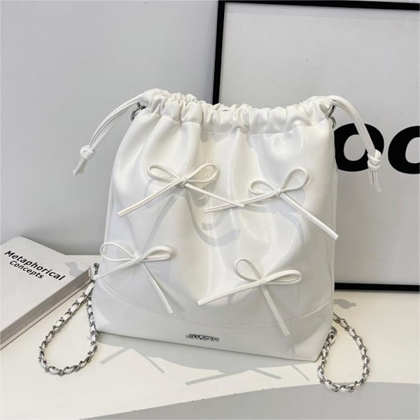 Nischdesign Bow Bag Damväskor 2024 Sommar Ny Mångsidig Kedjeväska Multifunktionell Hinkväska Silver