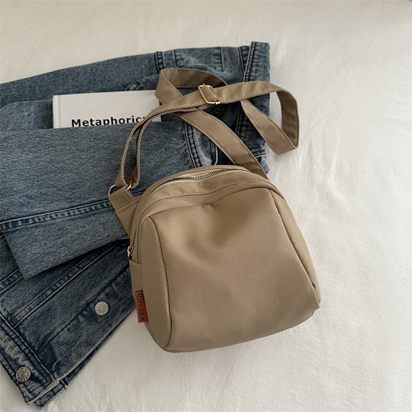 Pieni laukku crossbody-laukku naisille japanilaistyylinen vintage rento taiteellinen canvas-laukku opiskelija yksinkertainen yksivärinen Mori-tyyli olkalaukku Black