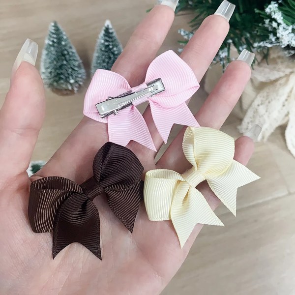 10 st/ set enfärgade rosett för barn Hårklämmor för baby Handgjorda band bowknot hårnålsspännen Nyår hårtillbehör 2640-3