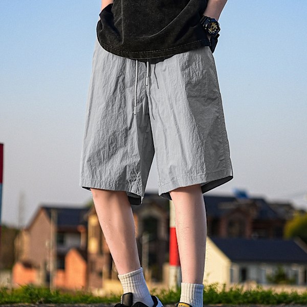 2024 Nya Cool Snabbtorkande Shorts Mäns Sommar Lättviktiga Japanska Pojkar Lös Fritid Sport Shorts Orange XL