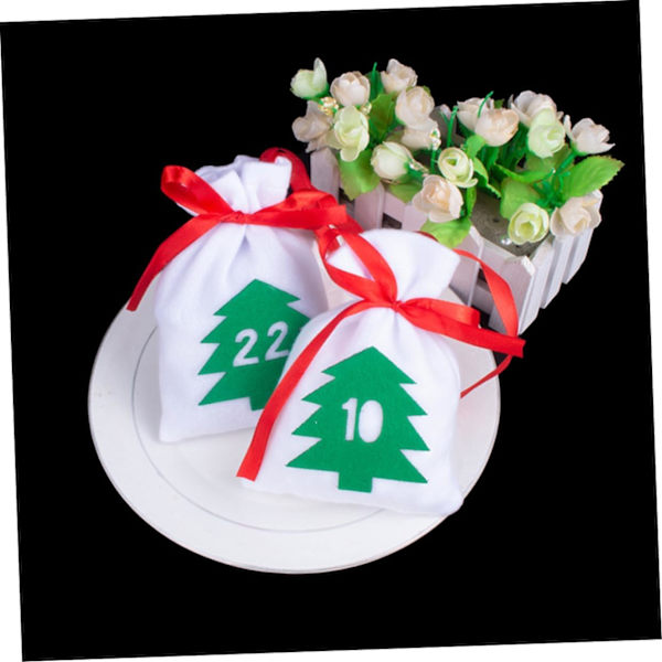 WJ 1Set 24 Styck Julgodispapper Flanellpåse Julgodispåse Julsnoddpåsar Adventskalender till julfavoritpåsar Väska hollow out 16X11CM