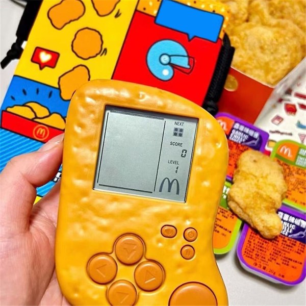 För barn Mcdonalds Mcnuggets Tetris handhållen spelkonsol med batteriklistermärken