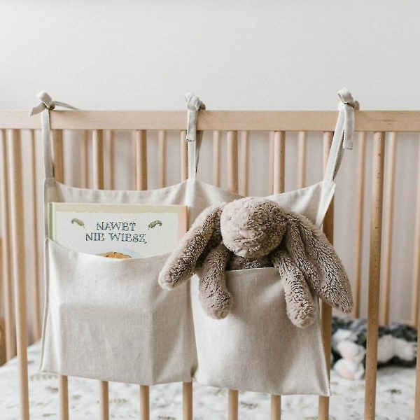 Ny baby krybbe lomme til børnehave arrangør Solid sengen hængende opbevaringstaske Beskrivelse Tremmeseng Sm62789