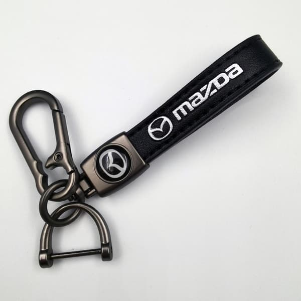 Two Sets of Leather Keychains with Mazda Logo, Spring Clips, and Car Brand Logo