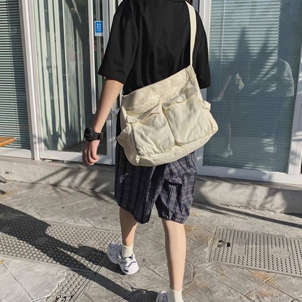 Klassisk unisex-budväska, vattentätt material och iögonfallande design Beige