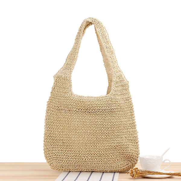 En axelväska i halm, handvävd väska beige