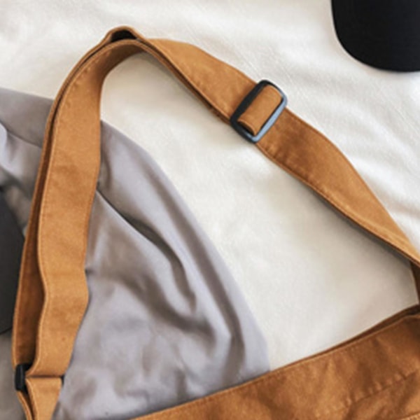 Klassisk unisex-budväska, vattentätt material och iögonfallande design Brown