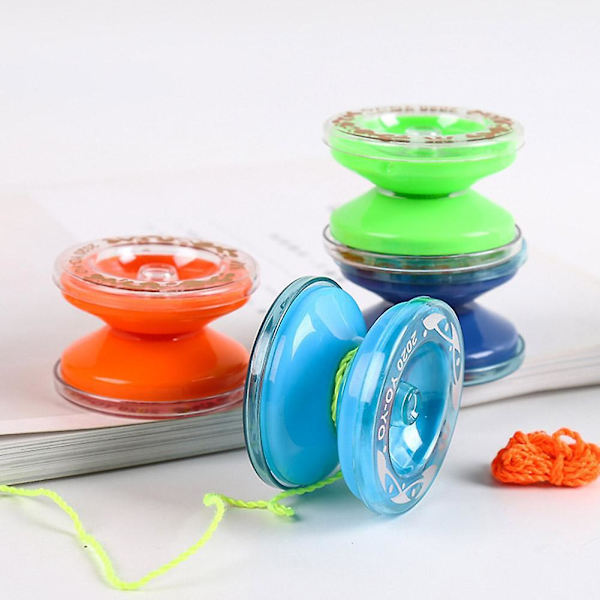 Miniatyr jojo-boll i plast, tecknad jojo-boll leksak för dagisgåvor (slumpmässig färg)