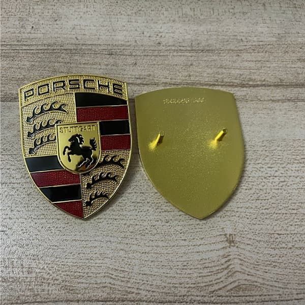 merkelogo porsche bil panser metall