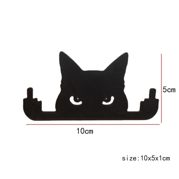 2 midterste finger kat sort kat rum vindue 10x5x1cm