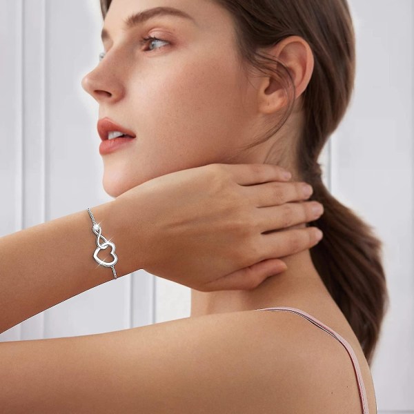 Infinity-armband i sterling silver med kristallreglage och zirkonhjärta, justerbar present för kvinnor