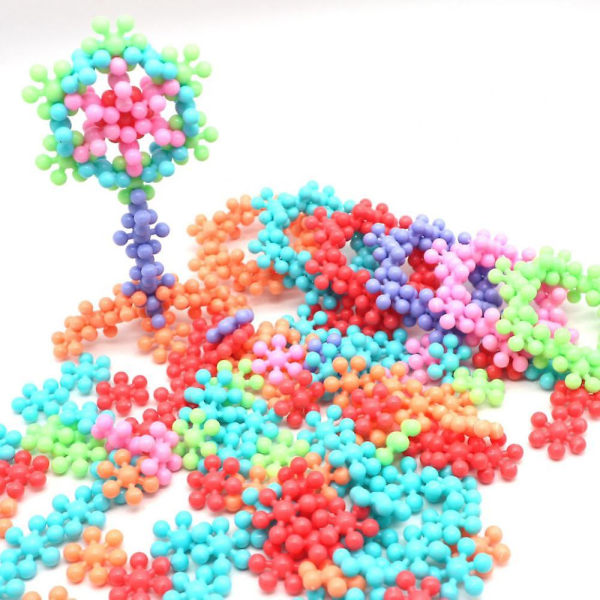 Barn 3D roterbara plommonblomma byggklossar tegel leksak DIY montering snöflingor 150 pieces bagged