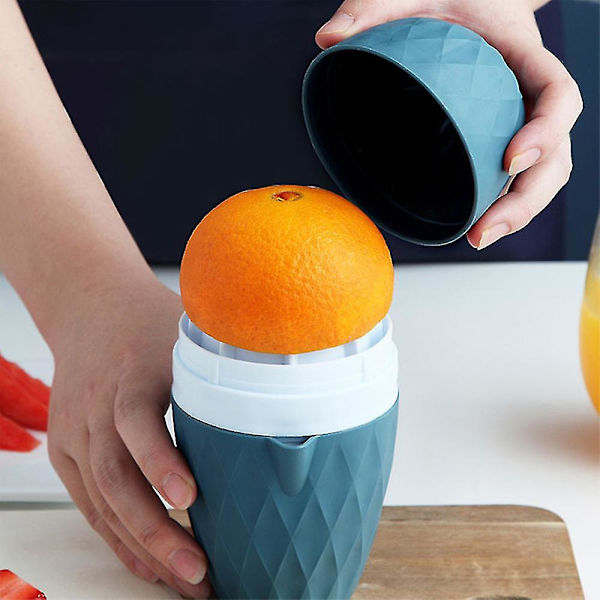 Blå manuell sitruspresse, mini gjenbrukbar bærbar blender for sitron og appelsinfrukt
