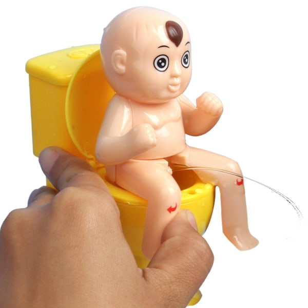 Peeing Boy Squirter Toy Squirt Små gutt sitter på toalettet Innovativ tvang Toalettdukke Leker