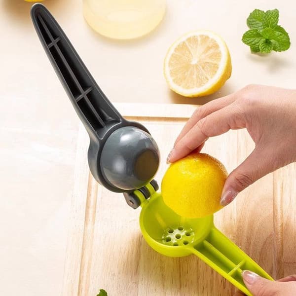 Sæt med 2 citruspressere: manuel citronpresser, manuel appelsinpresser, grøn citruspresser.