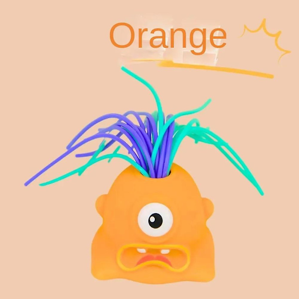 Stressin ja ahdistuksen lievittävät lelut lapsille, nukkevalikoima orange color