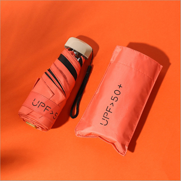 Mini paraply med UV-beskyttelse, UV-beskyttelse og lommer - orange