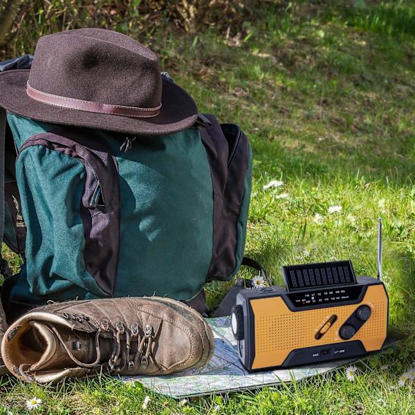 Håndsveiv Nødradio, Solar Bærbar Multifunksjonell Utendørs Nyhetsradio med 2000mAh Strøm/LED Lommelykt/SOS Alarm (Oransje)