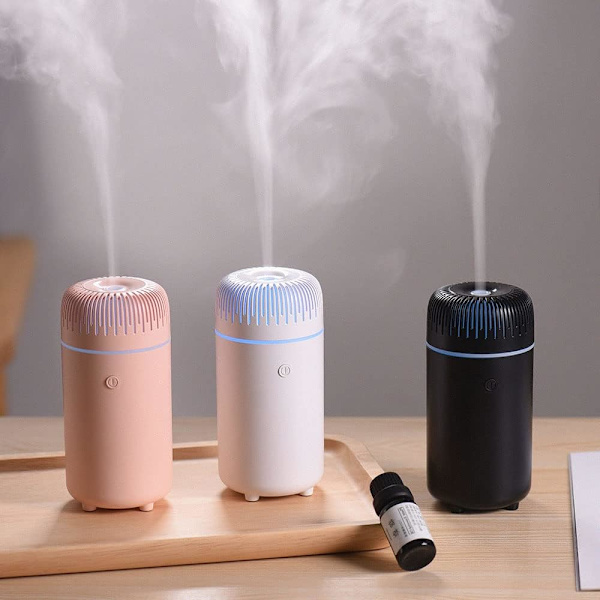 Bil diffuser luftfukter aromaterapi eterisk olje diffuser USB kald tåke mini bærbar diffuser for bil hjemmekontor soverom (rosa)