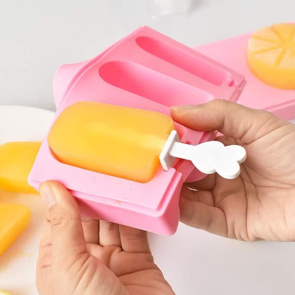 Set med 2 molds med lock och pinnar, klassisk form, vattenmelon, apelsin