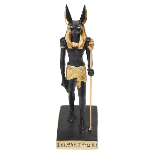 Den forntida egyptiska guden Anubis med rättvisevåg Staty De dödas gudar och livet efter detta som väger hjärtat mot strutsfjäderfiguren