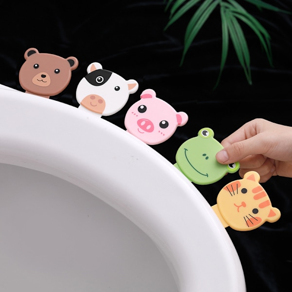 5-osainen WC-istuimen kannen avaaja Kannettava WC-kahva Kannen avaaja Sarjakuva-liimakoukku Läppä WC-istuimen kannen avaaja