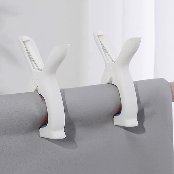 6 st plastklämmor, öronformade strandhandduksklämor blå