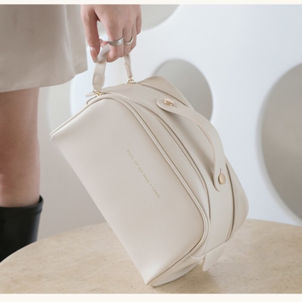 Mini-kosmetikväska i massivt läder white white