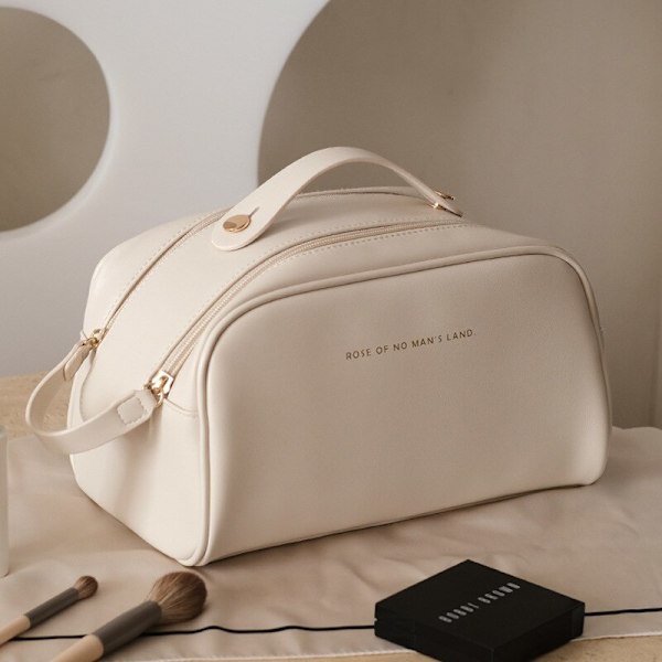 Mini-kosmetikväska i massivt läder white white