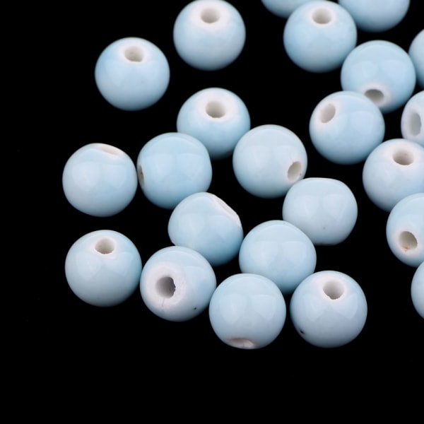 50st lösa keramiska pärlor Berlocker för smyckenstillverkning ljusblå 10mm