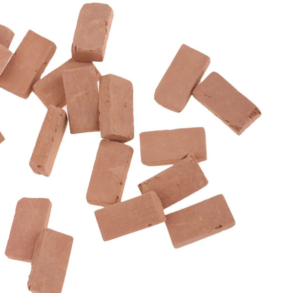 Miniatyrleksak av röda tegelstenar
