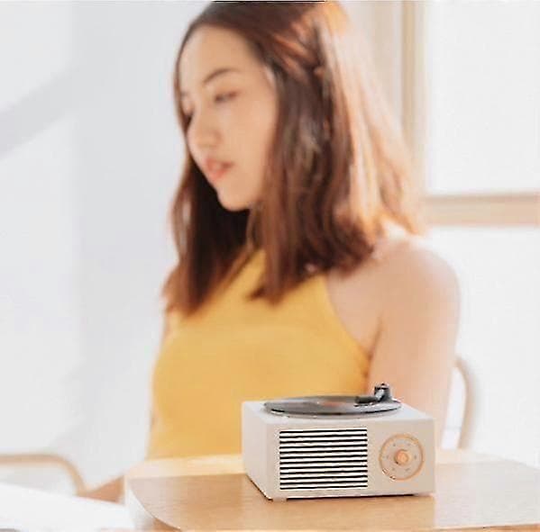 Vinyylilevysoitin Bluetoothilla ja sisäänrakennetuilla kaiuttimilla, langaton ääni nopeasti white