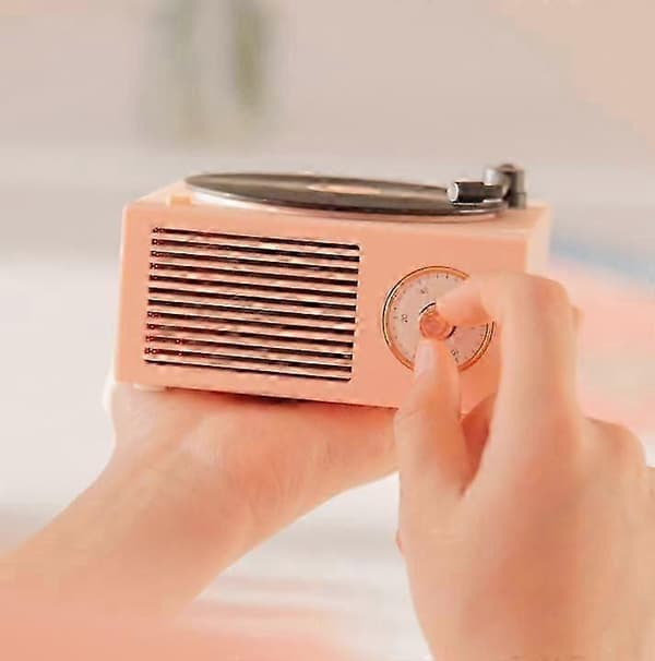 Vinyylilevysoitin Bluetoothilla ja sisäänrakennetuilla kaiuttimilla, langaton ääni nopeasti pink