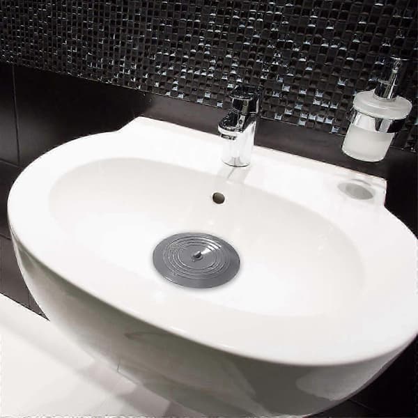 Stor universell silikonpropp och täcklock för diskho, handfat och badkar light grey