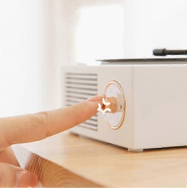 Vinyylilevysoitin Bluetoothilla ja sisäänrakennetuilla kaiuttimilla, langaton ääni nopeasti white