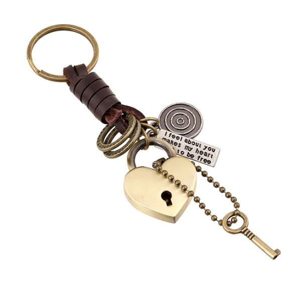 Kiva SteamPunk-tyylinen avaimenperä - sydänlukko avaimella