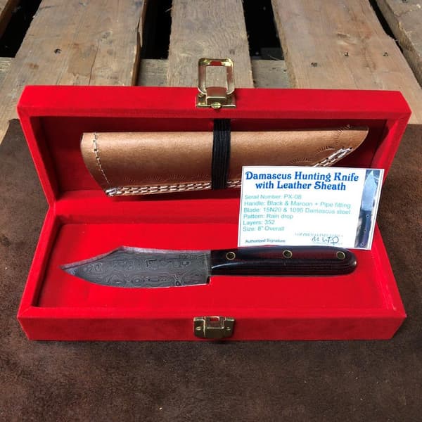 Käsityönä tehty metsästysveitsi Damaskos micarta Brown