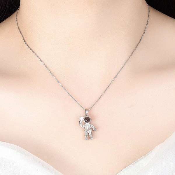 Astronaut projection necklace - silver color