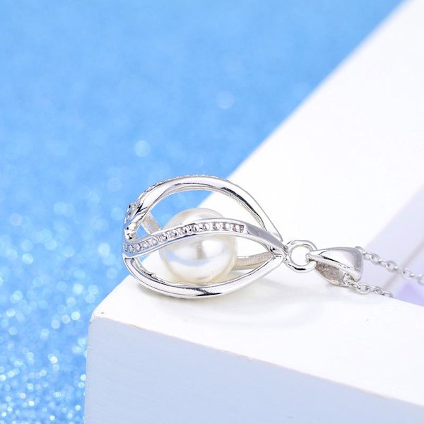Necklace - silver color  with imitation pearls