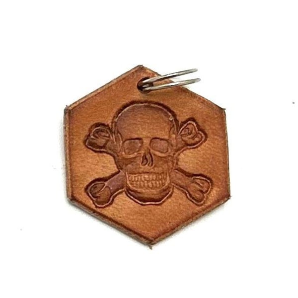 Handmade pendant with scull and bone made of swedish leather
