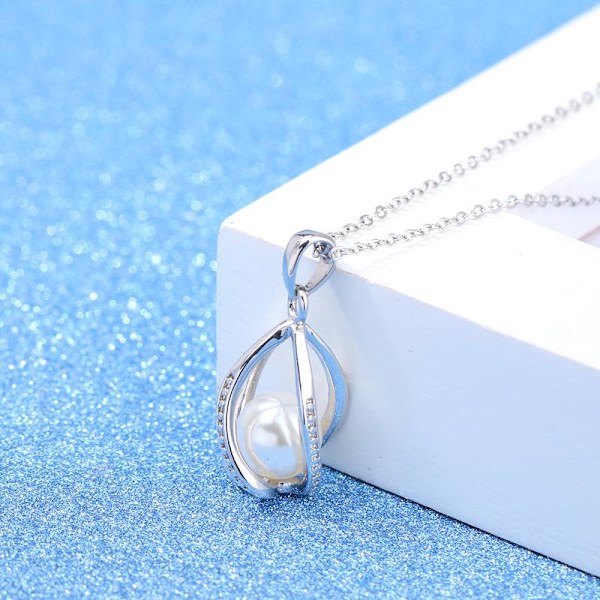 Necklace - silver color  with imitation pearls