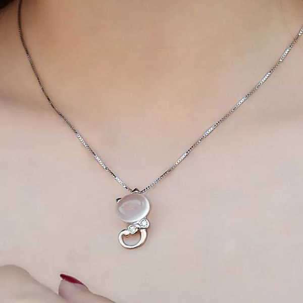 Silverfärgat katthalsband med rosa imitations pärla