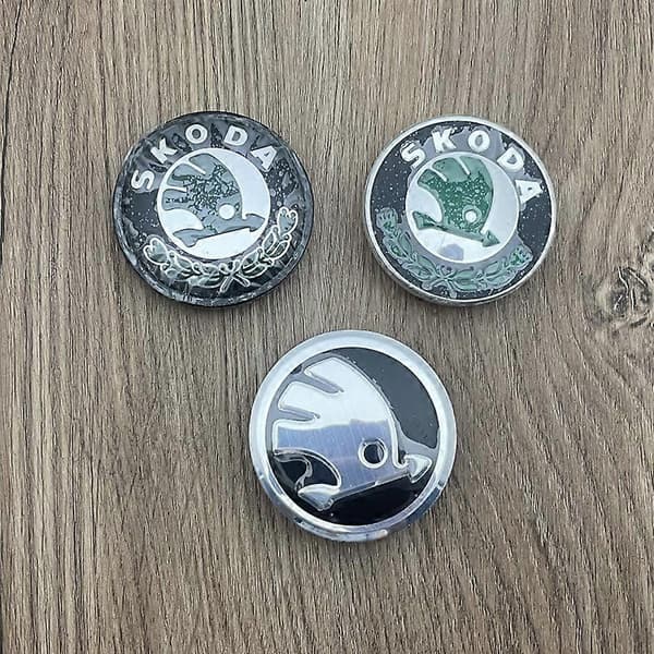 Sæt med 4 sorte hjulkapsler til Skoda 56 mm