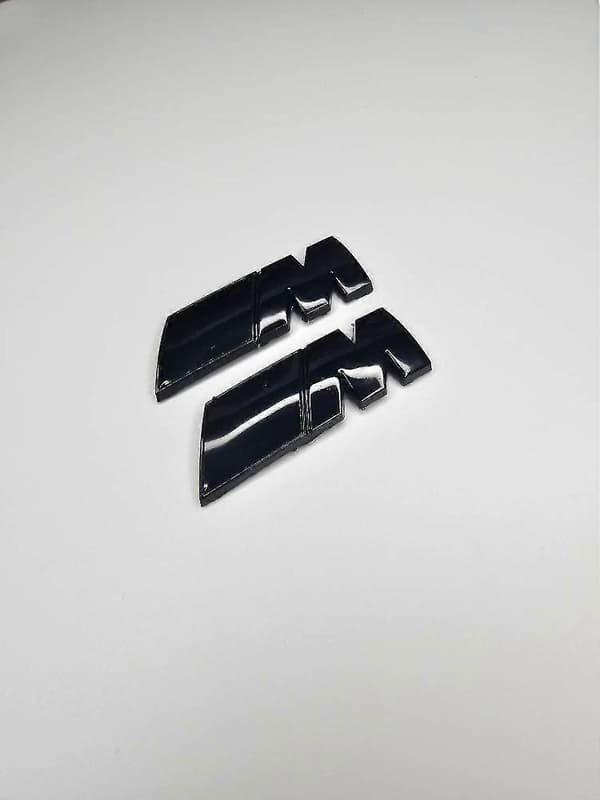 M Performance Gloss Black Badge -QH