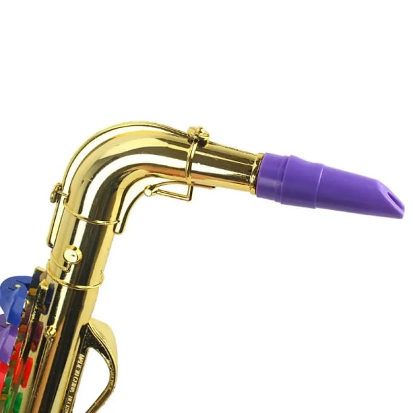 Musikinstrument inkluderar leksakssaxofon trumpet leksaksklarinett E Silver